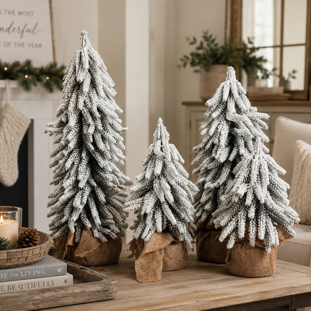Realistic faux snow-covered tabletop Christmas tree with adjustable branches and rustic jute-wrapped fir wood base