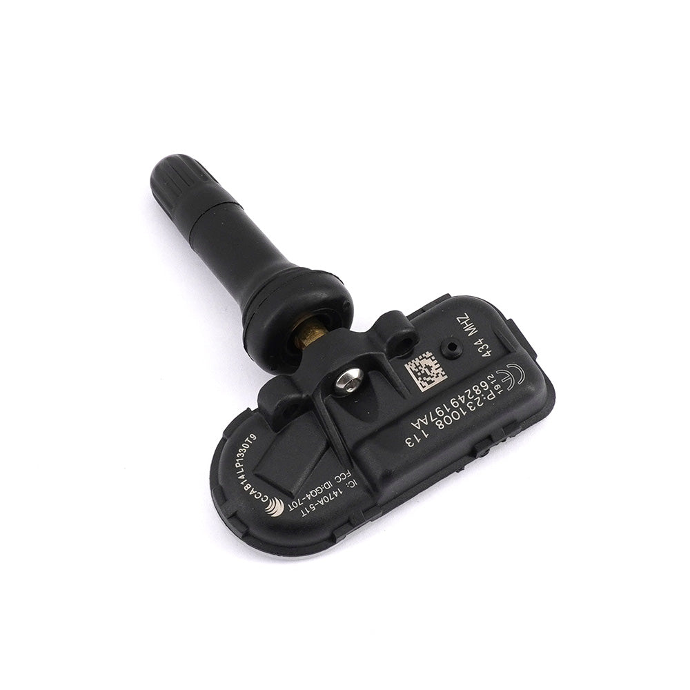 Four black automotive tyre pressure monitoring sensors arranged on a clean white background — view 4
