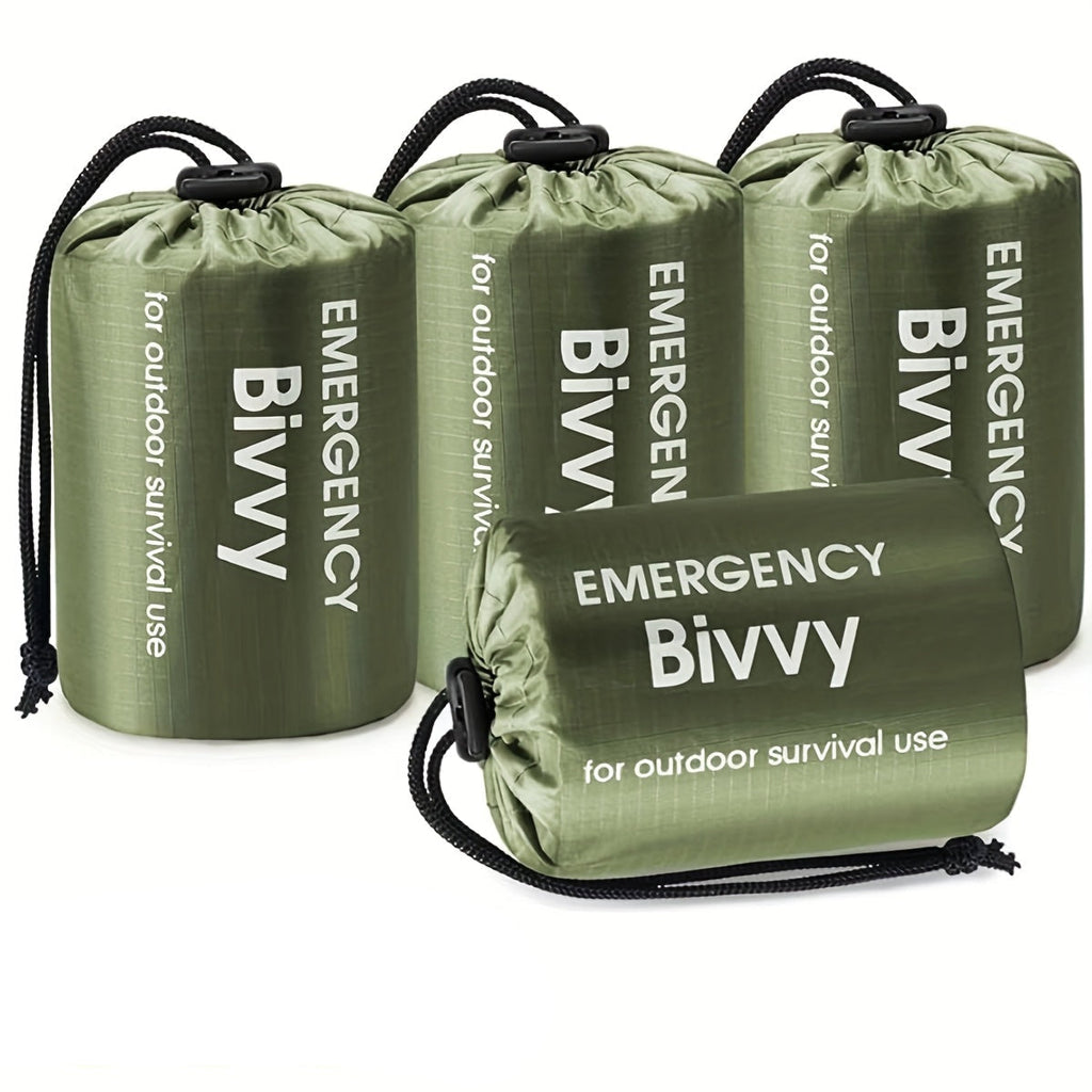 Green outdoor camping sleeping bag set with compass and whistle, four pack rectangular polyethylene design.