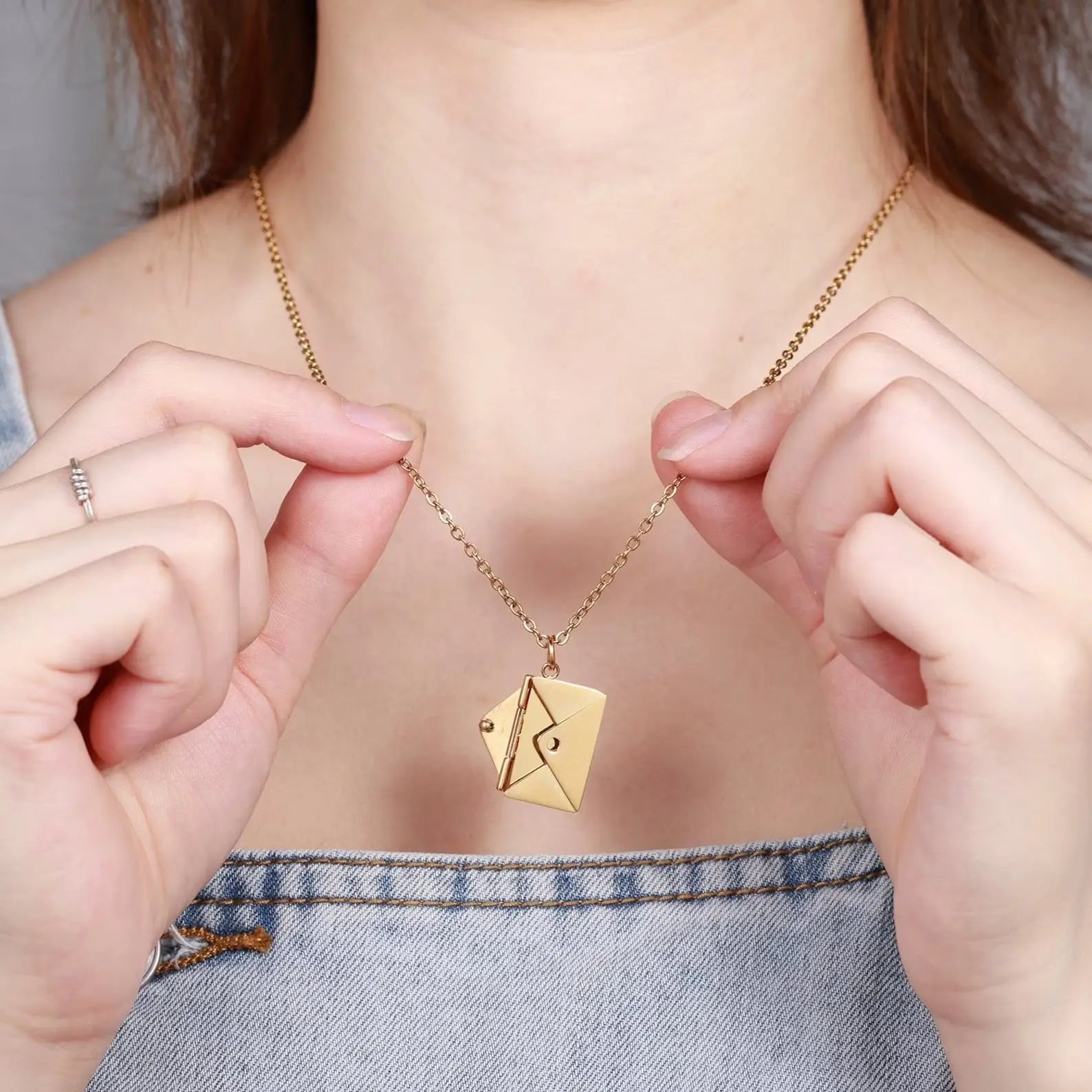 Personalized envelope necklace in gold displaying a hidden custom message pendant inside a box — view 2