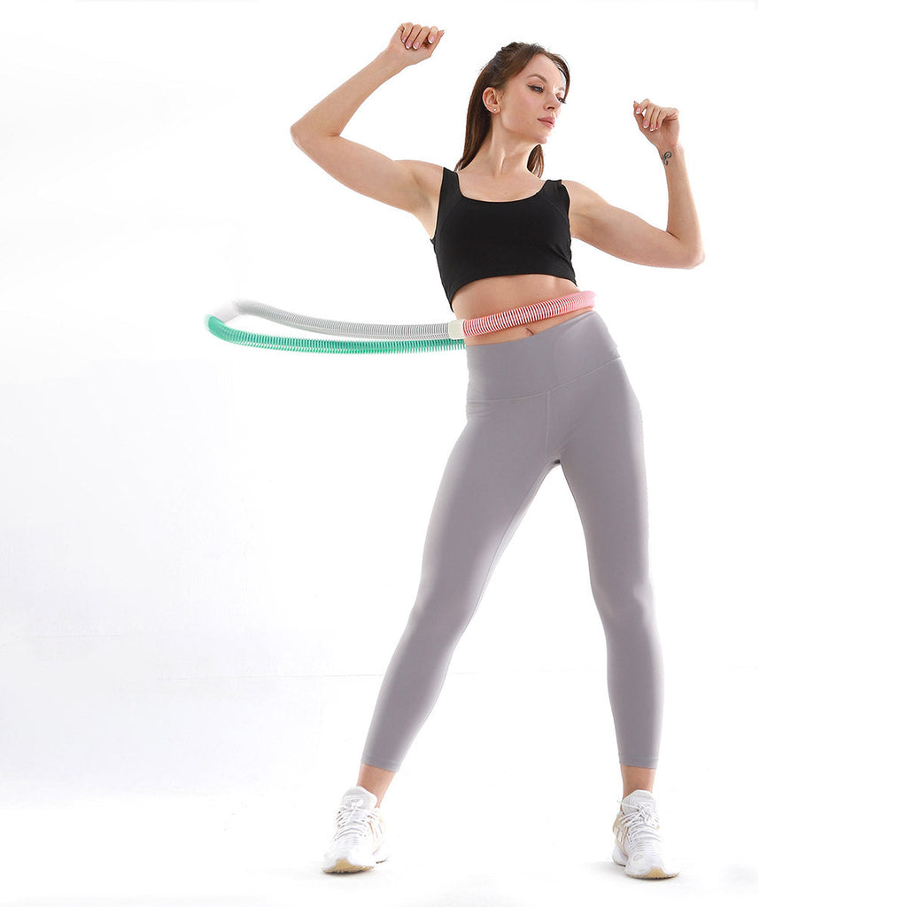 Soft weighted hula hoop in vibrant multicoloured flexible plastic showing adjustable spring resistance design — view 2