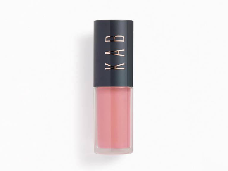 Mini hydrating tinted lip oil tube with a large doe-foot applicator and sheer glossy finish — view 2