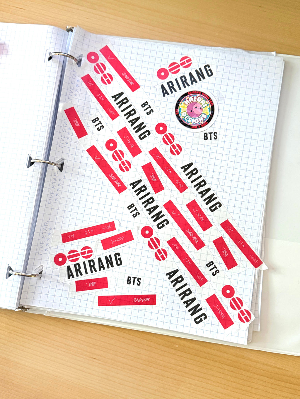 BTS Arirang washi tape roll featuring striking red graphics for scrapbooking and journal decoration