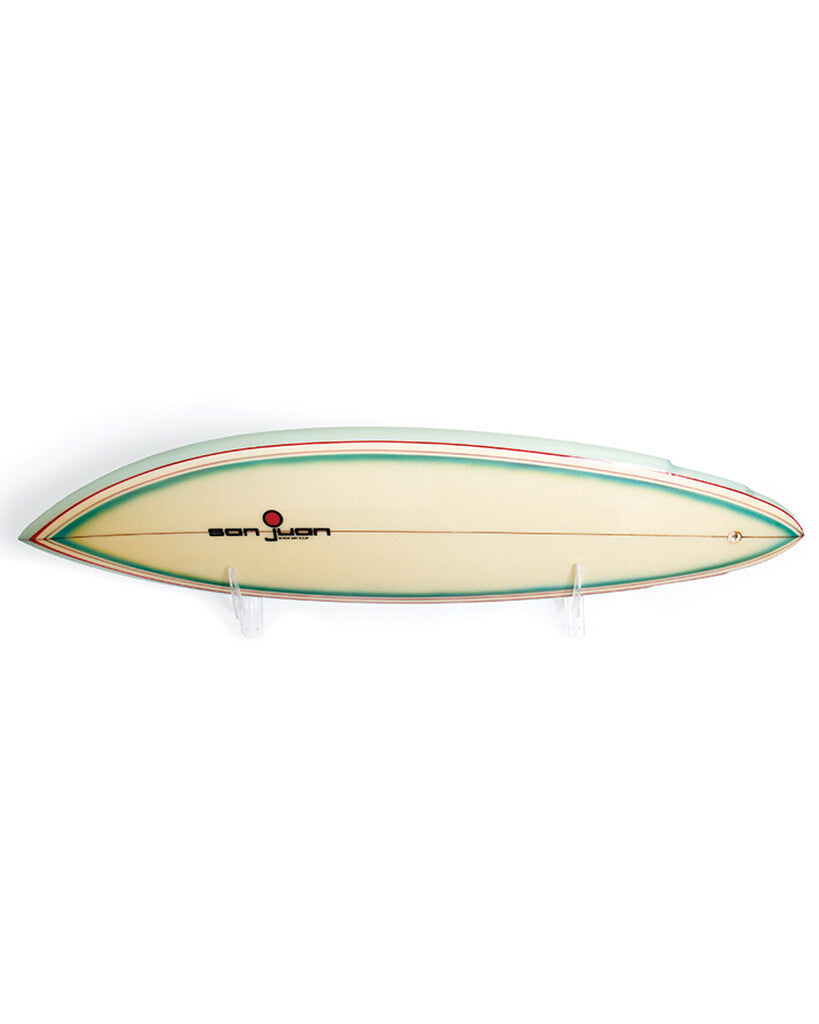 Clear acrylic horizontal surfboard wall display rack with cushioned bumpers supporting a surfboard. — view 3