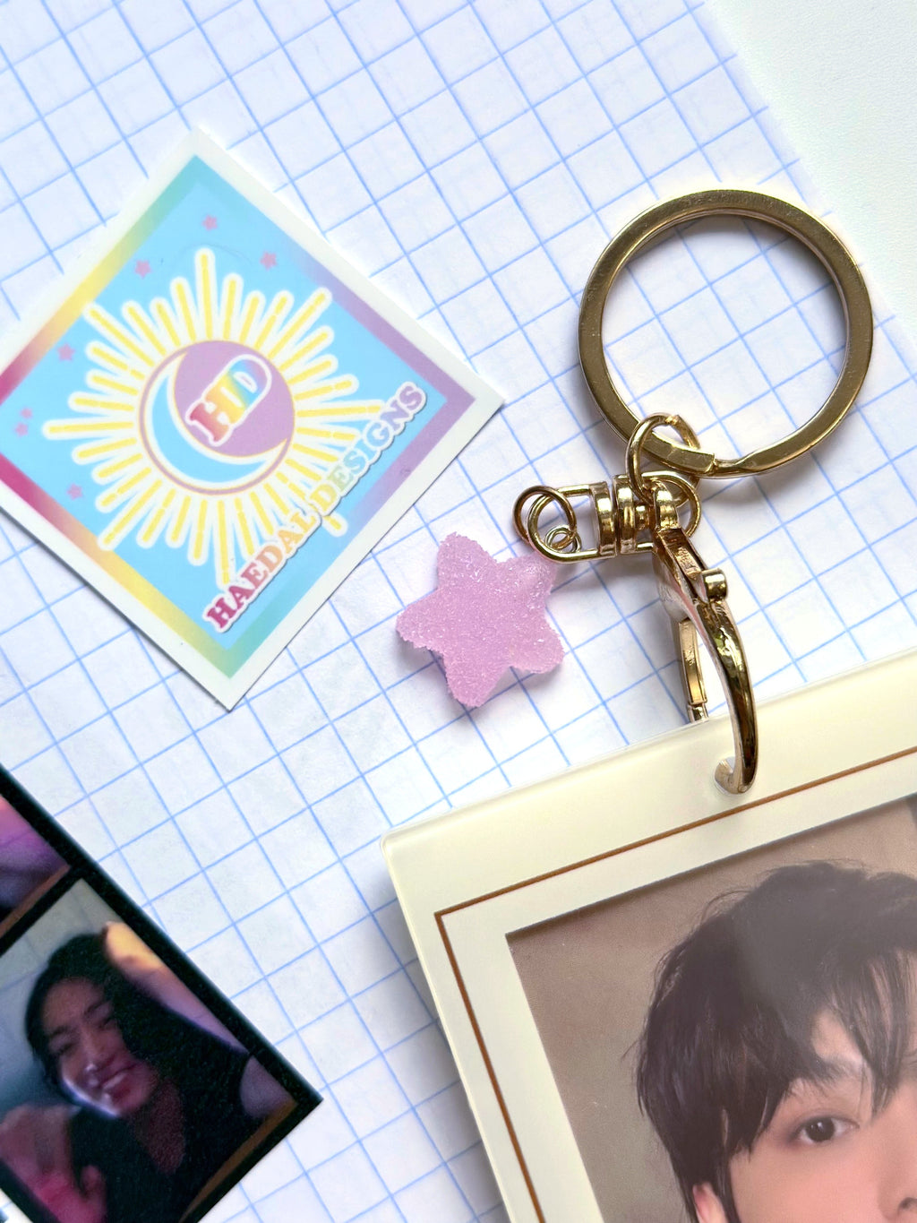 Custom Jung Kook logo charm keychain in vibrant PLA attached to a gold metal keyring — view 4