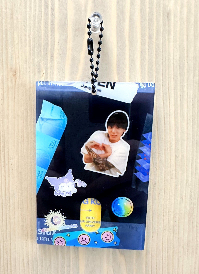 Clear acrylic Jungkook polaroid photocard holder keychain with black ball chain and claw clasp — view 4
