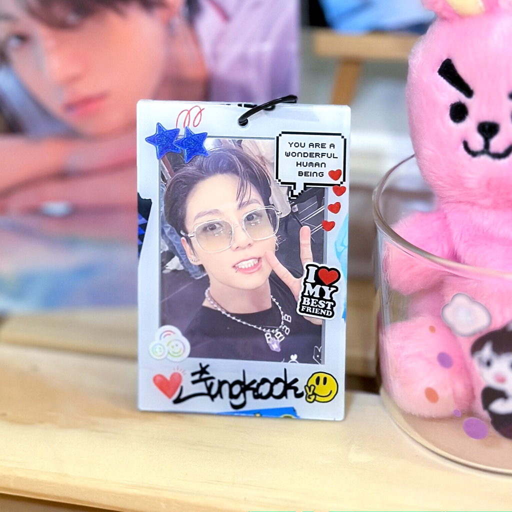 Clear acrylic Jungkook polaroid photocard holder keychain with black ball chain and claw clasp — view 2