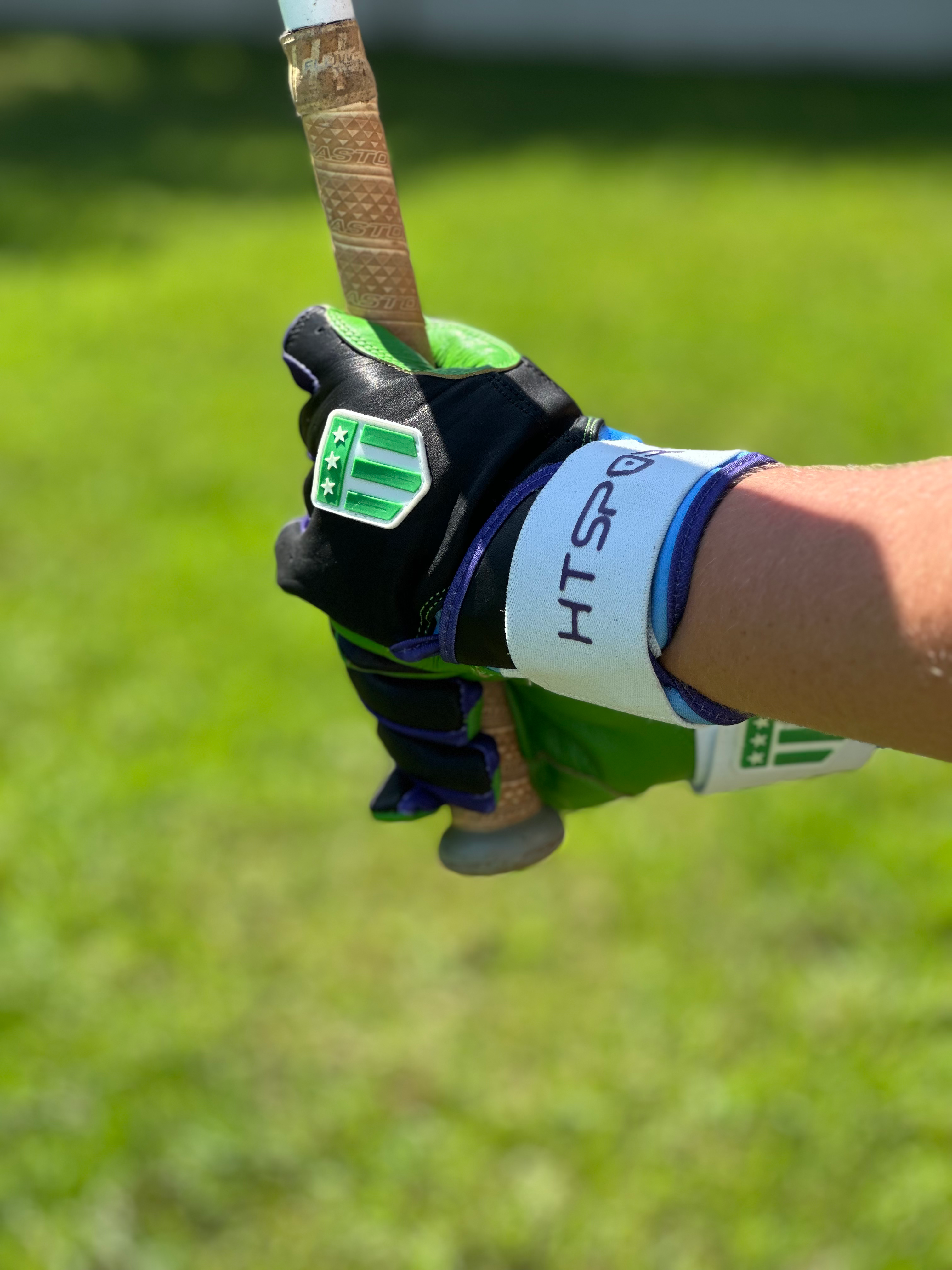 Tampa Bay long cuff batting glove in black with vibrant neon green palm and premium leather — view 6