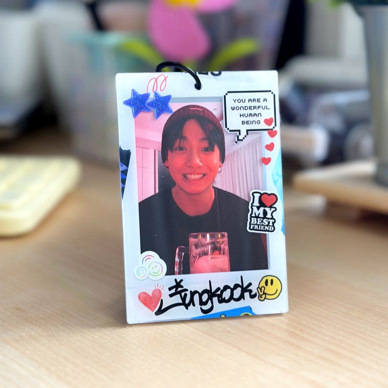 Clear acrylic Jungkook polaroid photocard holder keychain with black ball chain and claw clasp — view 6