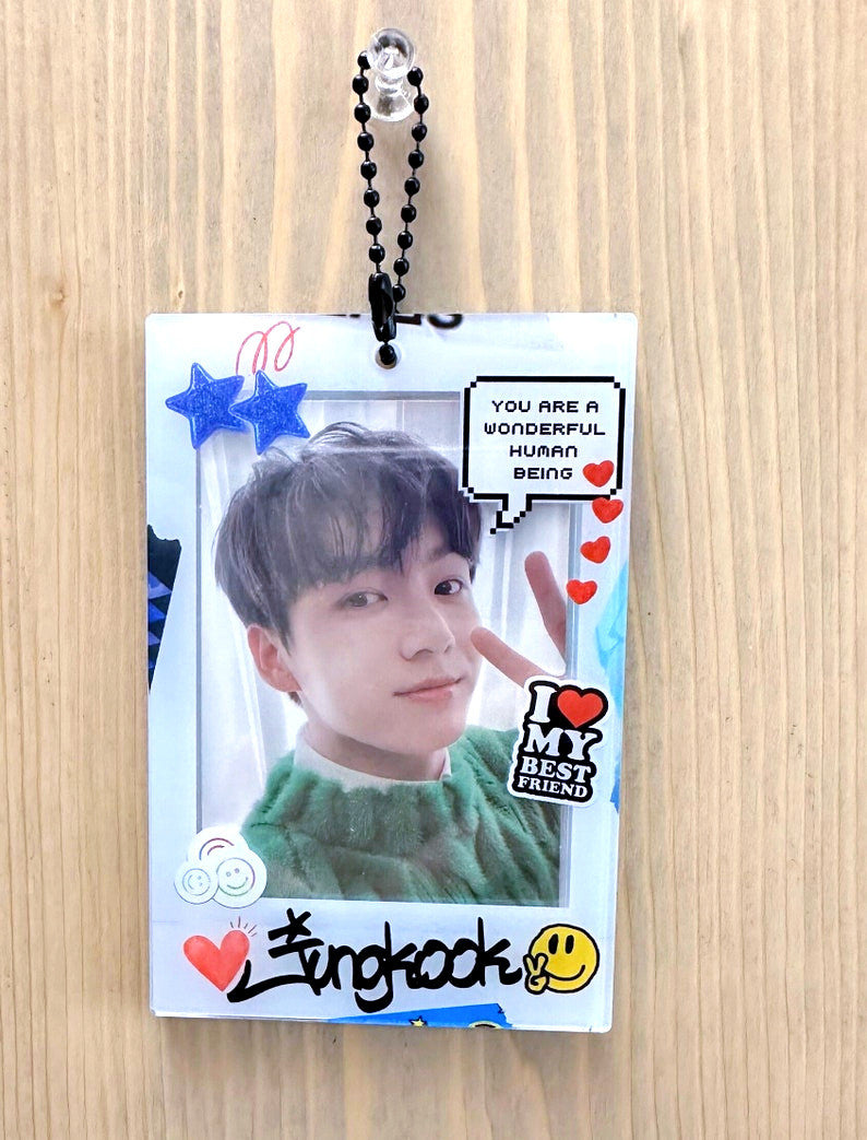 Clear acrylic Jungkook polaroid photocard holder keychain with black ball chain and claw clasp — view 3