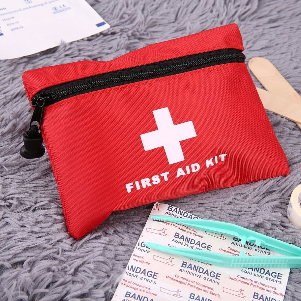 Mini car first aid kit in a compact nylon travel pouch for emergency survival — view 3