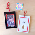 BTS Arirang acrylic photocard holder keychain with bold red frame and minimalist display layout.