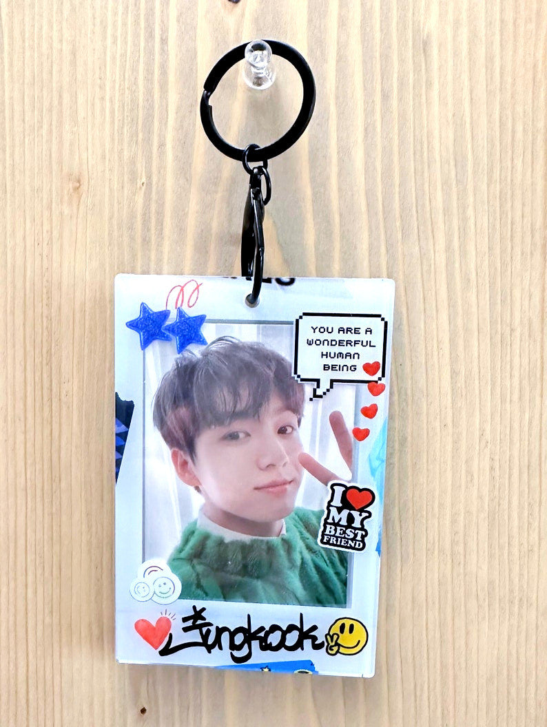 Clear acrylic Jungkook polaroid photocard holder keychain with black ball chain and claw clasp — view 5