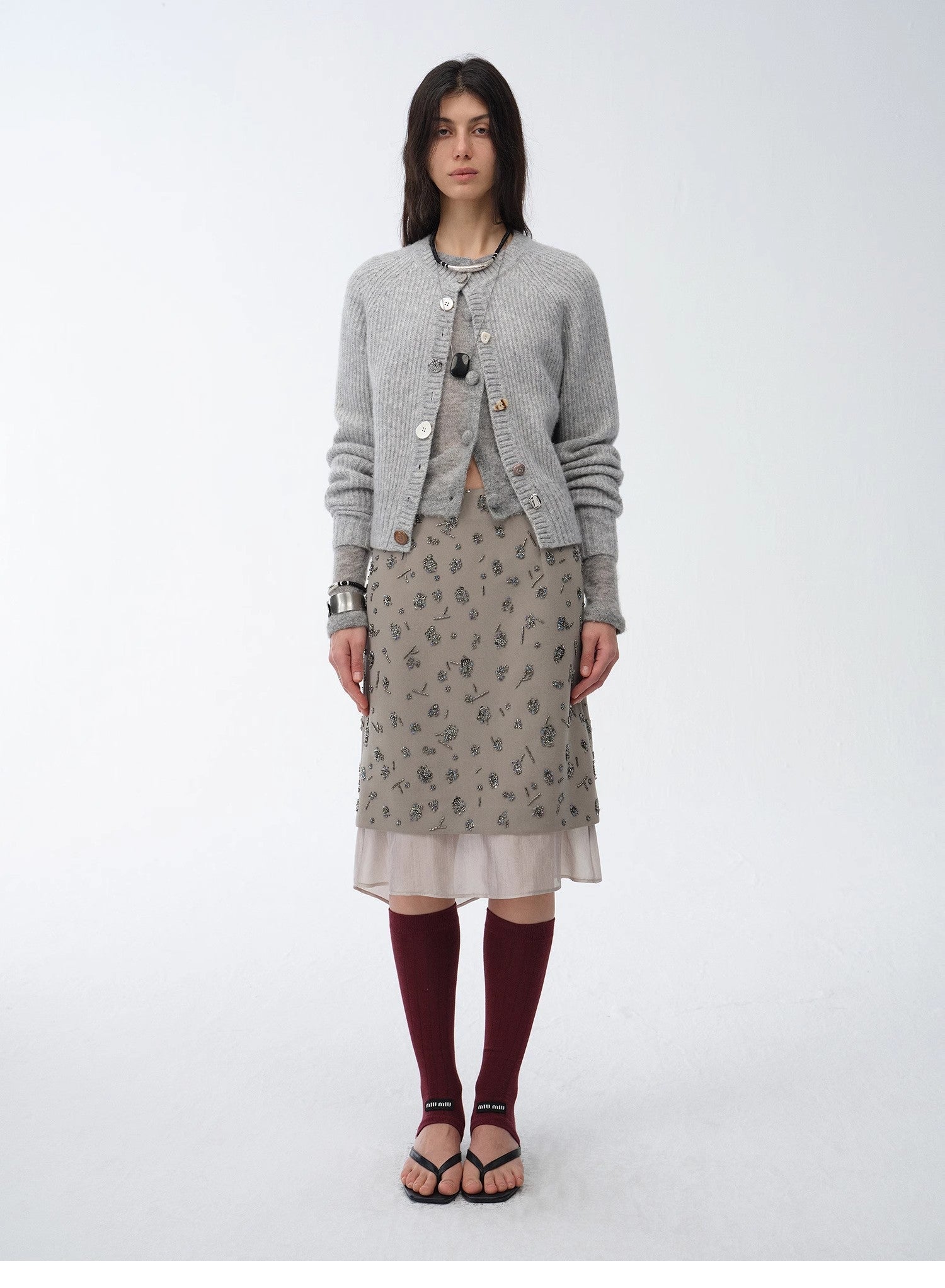Womens asymmetrical hand-embroidered sequin floral skirt with sheer irregular hemline detailing. — view 2