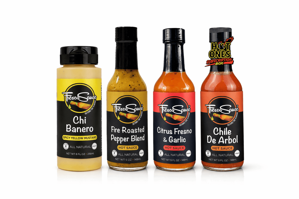Fresco hot sauce four pack gift set featuring four glass bottles of spicy condiments in box — view 2