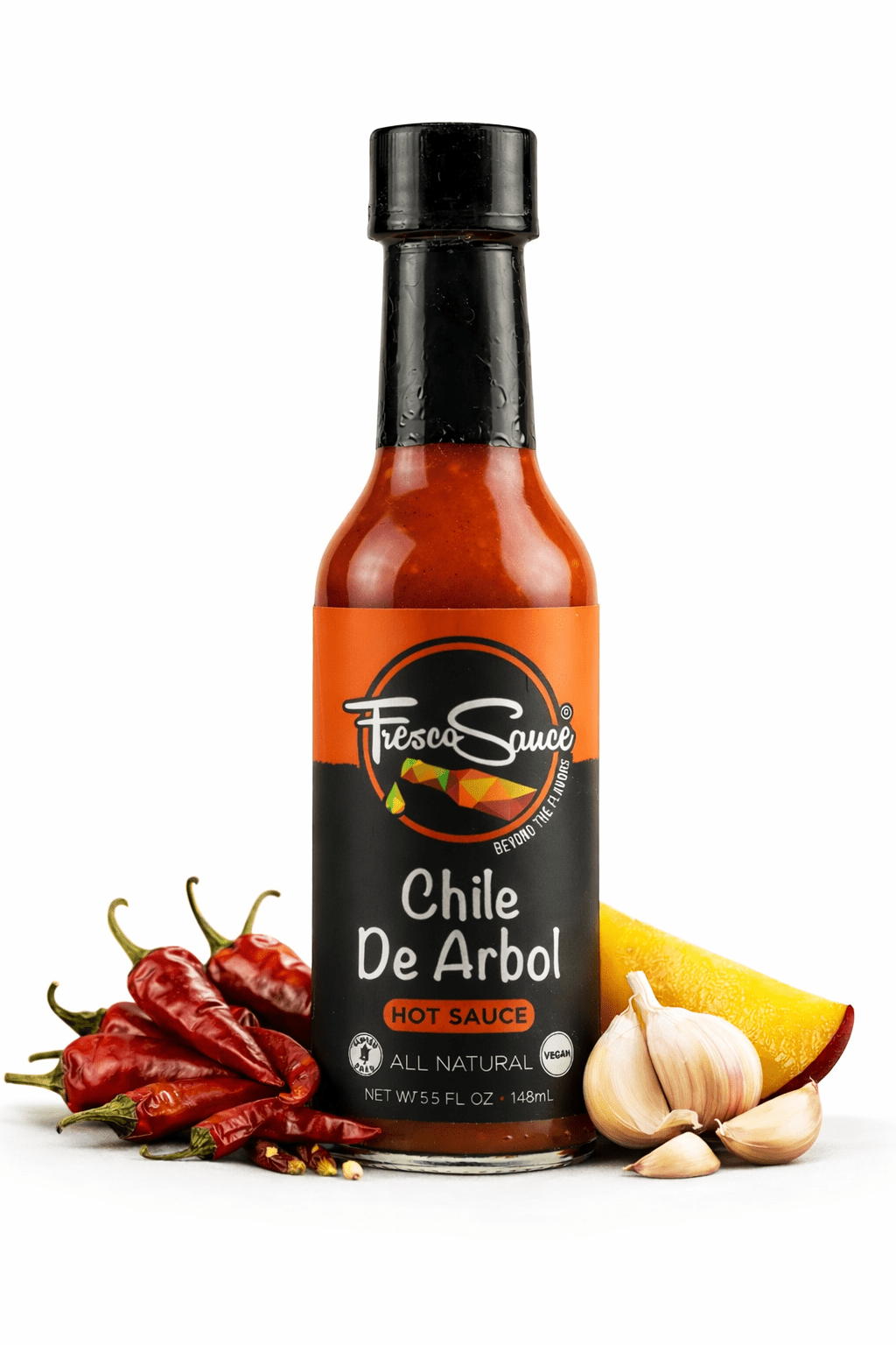Fresco Sauce Chile De Arbol hot sauce bottle with fiery red liquid and natural ingredients. — view 3