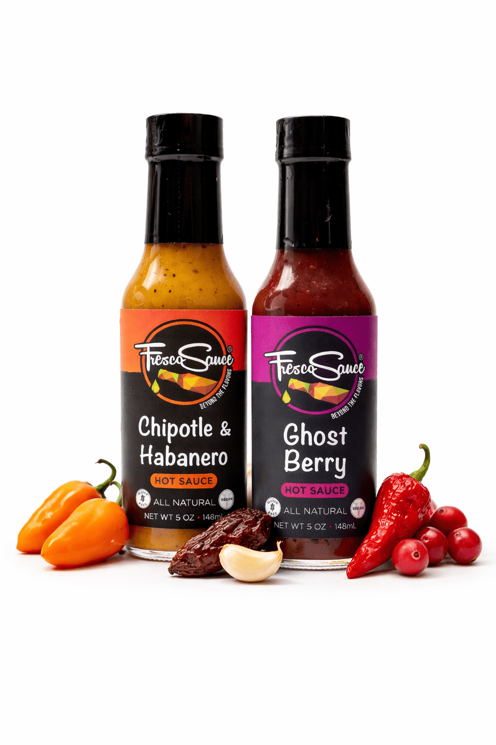 Ghost Habanero Duet hot sauce twin pack featuring garlicky chipotle and fruity ghost berry glass bottles