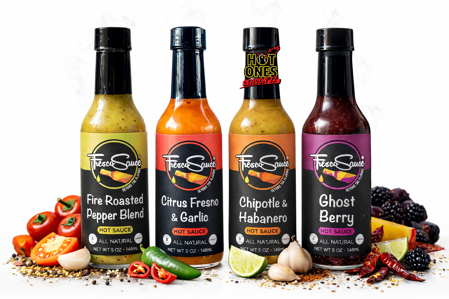 Hot sauce four pack gift box displaying four artisan glass bottles in a premium package — view 2