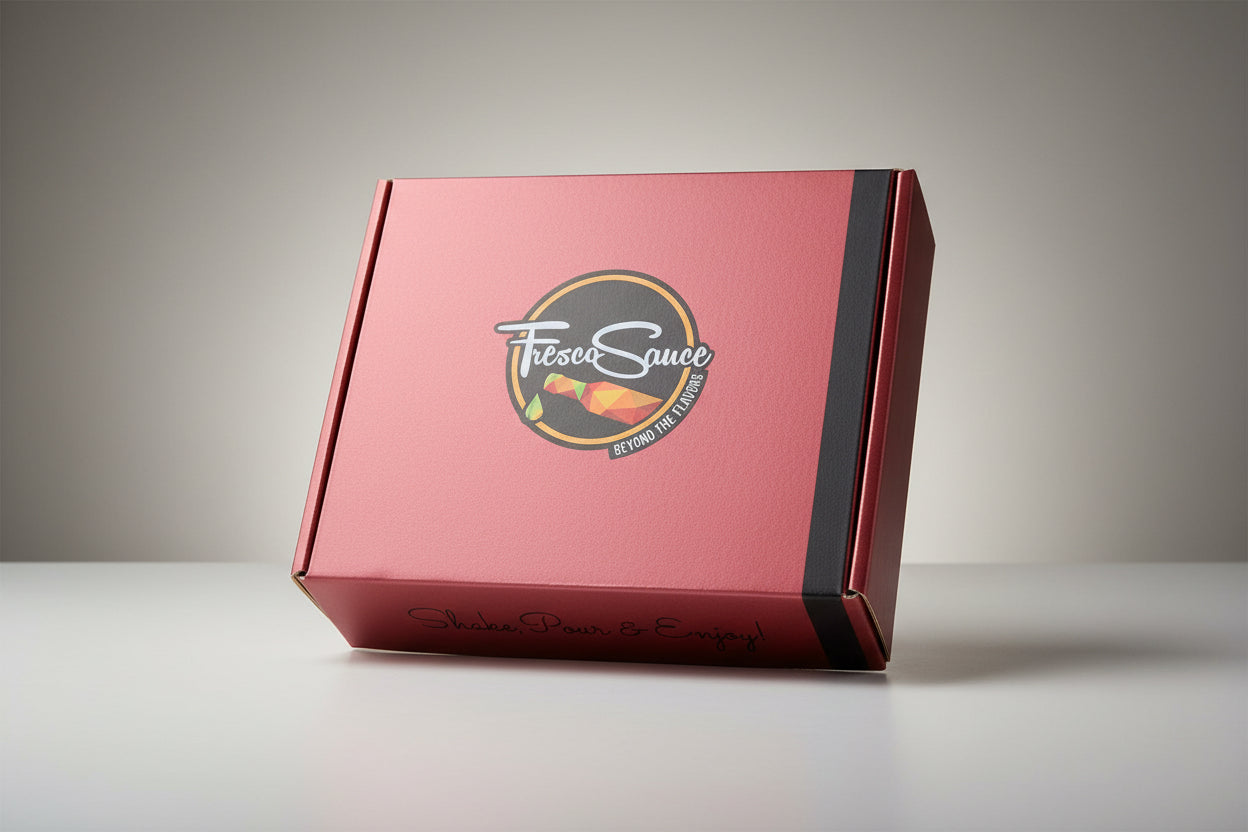 Hot sauce four pack gift box displaying four artisan glass bottles in a premium package — view 4