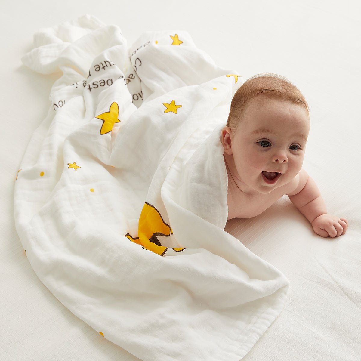Yellow six-layer cotton baby bath swaddle blanket featuring cute crown and star prints