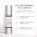 Organic age reversing eye serum bottle with vitamin C and peptides for dark circles
