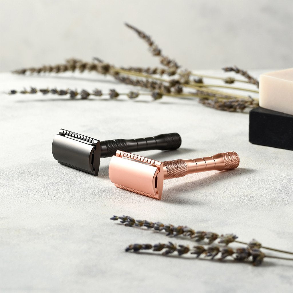 Reusable metallic safety razor with a thick handle available in rose gold or black finishes — view 3