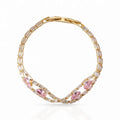 Gold-plated pink zircon bow bracelet on clear background