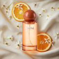 Caché Libre Absolu women's floral Eau de Parfum glass bottle with golden accents.