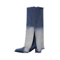 Gradient navy frayed denim knee-high boots with pointed toe, front slit, and sculpted mid-heel