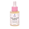 Natural hair growth serum bottle with botanical oil blend for scalp and healthy hair roots