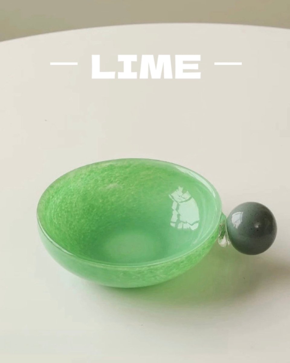 Whimsical handblown glass salad bowl with tropical fruit inspired design functioning as eclectic home decor — view 5