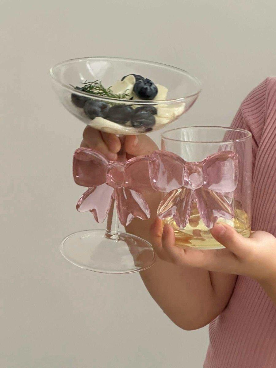 Handmade cocktail coupe set of two with delicate pink glass bows attached to the clear stems — view 4