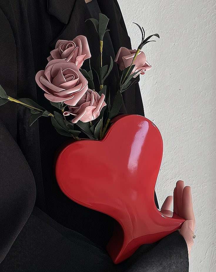 Handmade ceramic heart-shaped flower vase in a retro decorative pottery style for eclectic home decor
