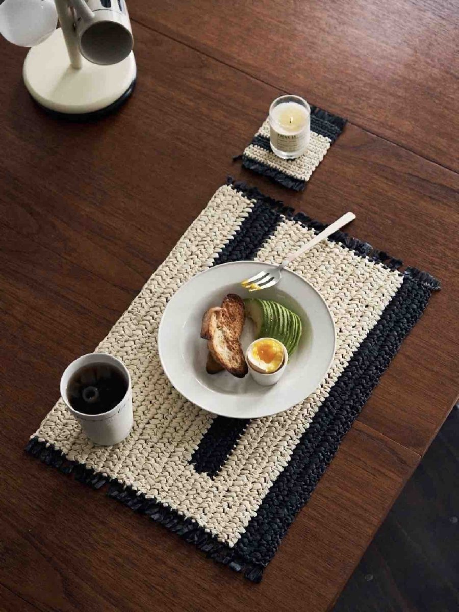 Retro handwoven natural reed placemat set of four on an elegantly styled Nordic dining table — view 4