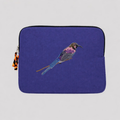 Tacazze Sunbird cotton canvas laptop sleeve featuring detailed bird embroidery in warm earthy colors