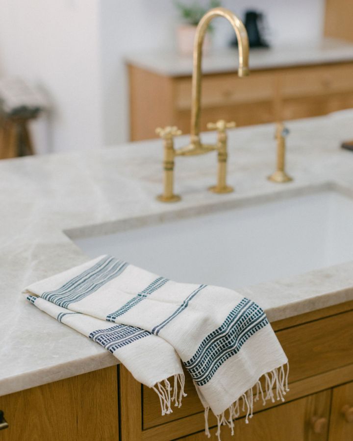 Aden cotton hand towel in a folded stack, showcasing rich hand-spun Ethiopian cotton texture — view 2