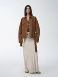 Women's retro distressed flocked denim jacket with leg of mutton sleeves and low waistband