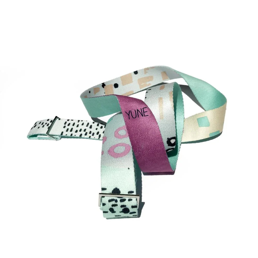 Hemlock yoga strap in forest green organic cotton with adjustable metal D-ring buckles