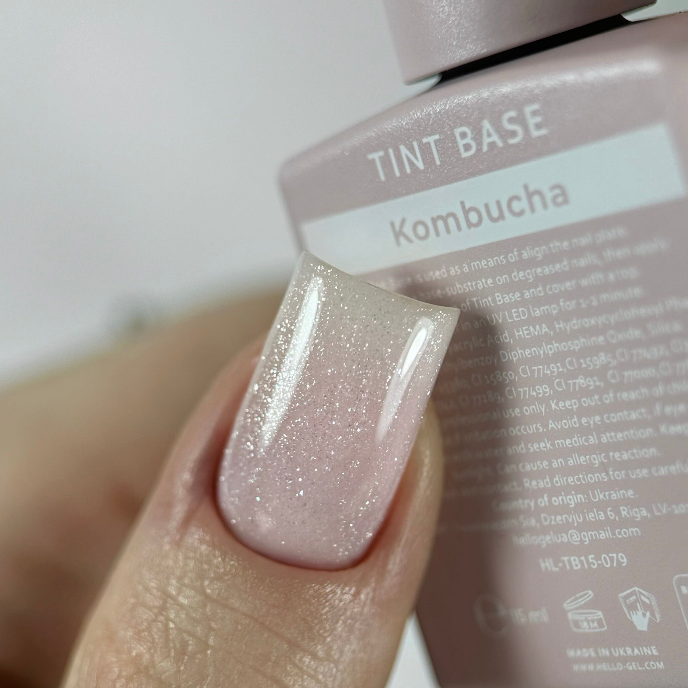 15ml bottle of HEYLOVE Tint Base Kombucha, a soft natural tinted gel for professional manicures — view 2