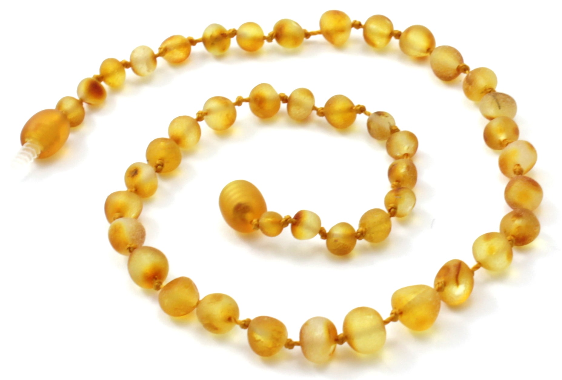 Unpolished raw honey golden Baltic amber children's necklace with oval baroque beads on yellow string