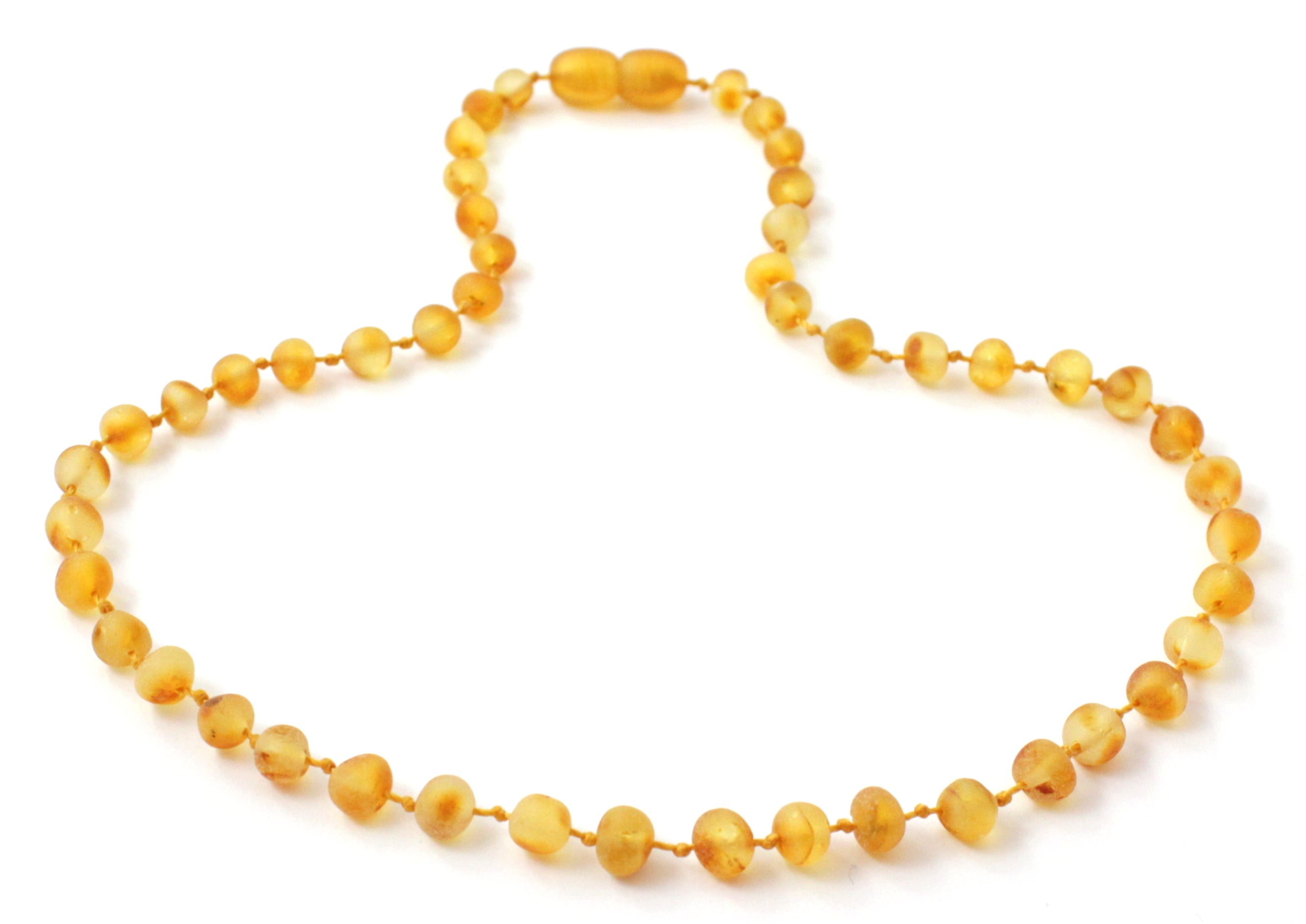 Unpolished raw honey golden Baltic amber children's necklace with oval baroque beads on yellow string — view 2