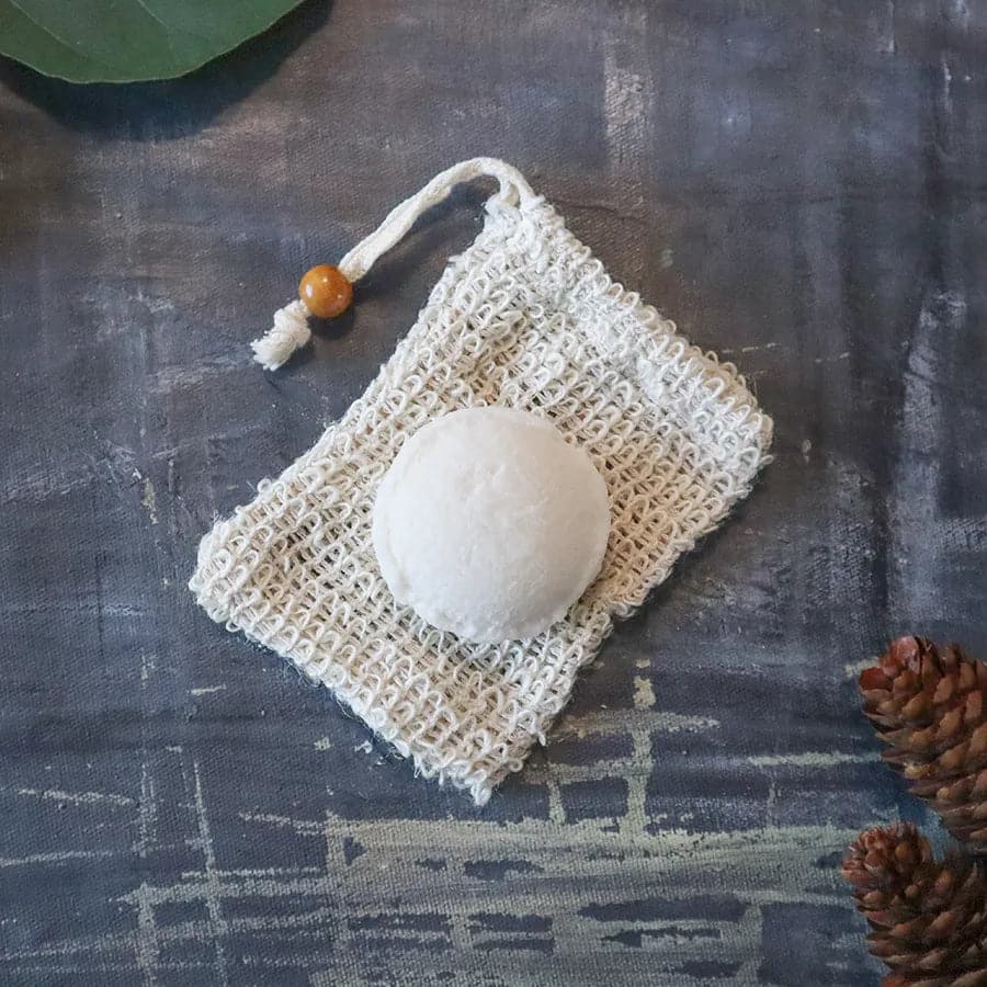 Solid round hydrating shampoo and conditioner bars for eco friendly zero waste hair care — view 4