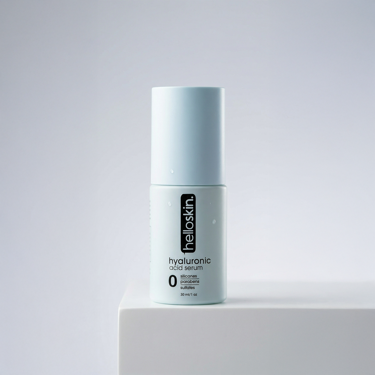 Hyaluronic acid facial serum bottle with jojoba oil for deep skin hydration and glowing complexion.