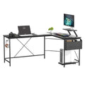 Black L-shaped corner desk with movable monitor stand and side storage bag for home office
