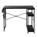 Black L-shaped gaming computer desk with steel frame and fabric storage bag for modern offices.