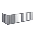 Freestanding grey wooden six panel pet gate folded open on a smooth indoor floor