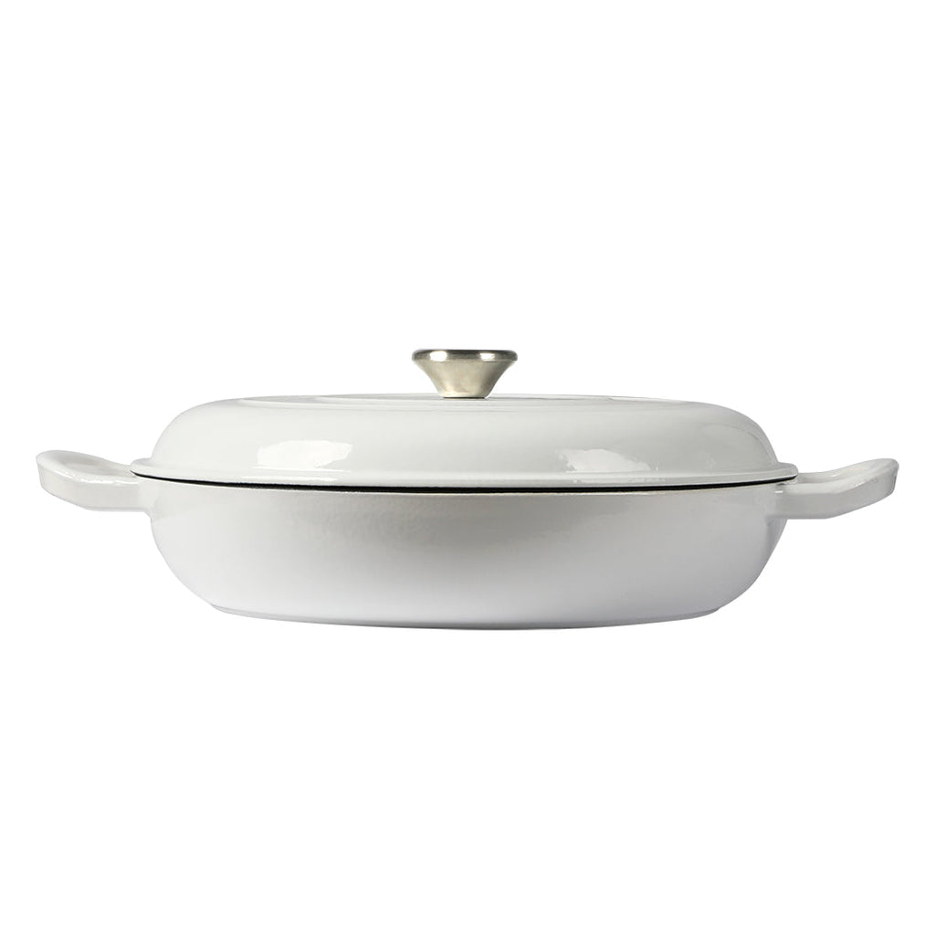 White 3.5L cast iron enamel Dutch oven pan with lid and side handles for cooking.