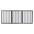 Grey wooden freestanding three panel pet gate folded out on a flat floor surface