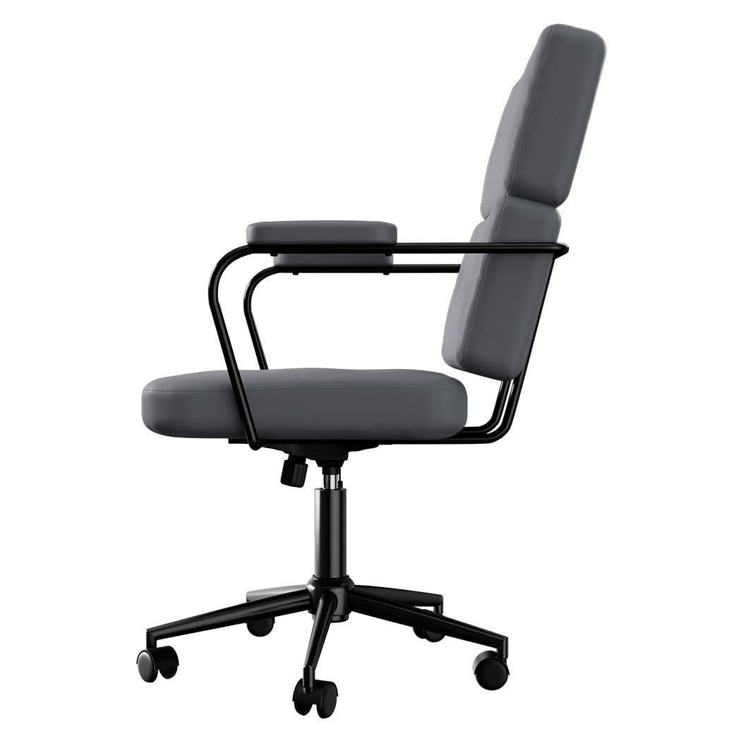 Grey ergonomic office chair in PU leather with adjustable high back and metal swivel base.