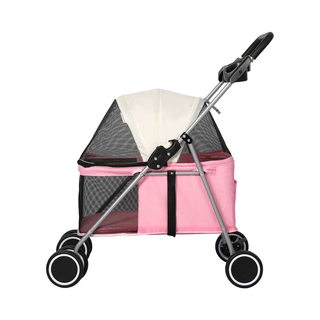 Pink foldable PaWz pet stroller with breathable canopy, detachable carrier basket, and sturdy black wheels.